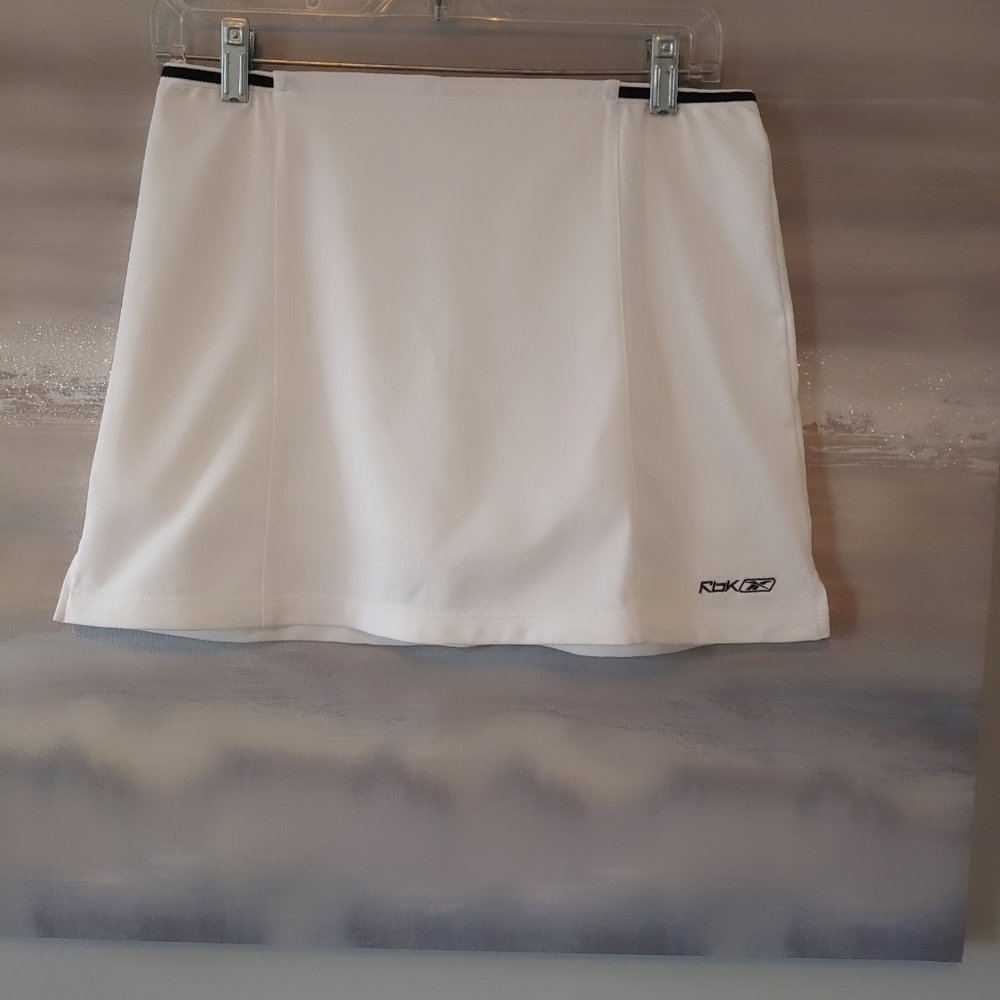Reebok white with blue trim sports Skort.